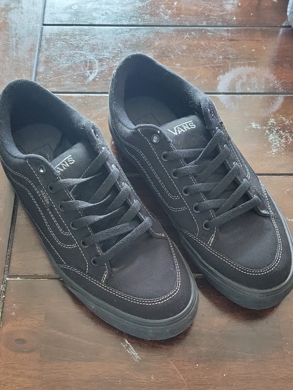Vans Black Low-Top Canvas & Suede Sneakers with White Stitching